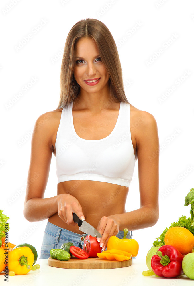 beautiful young woman cutting vegetables, isolated on white beautiful young woman cutting vegetables, isolated on white