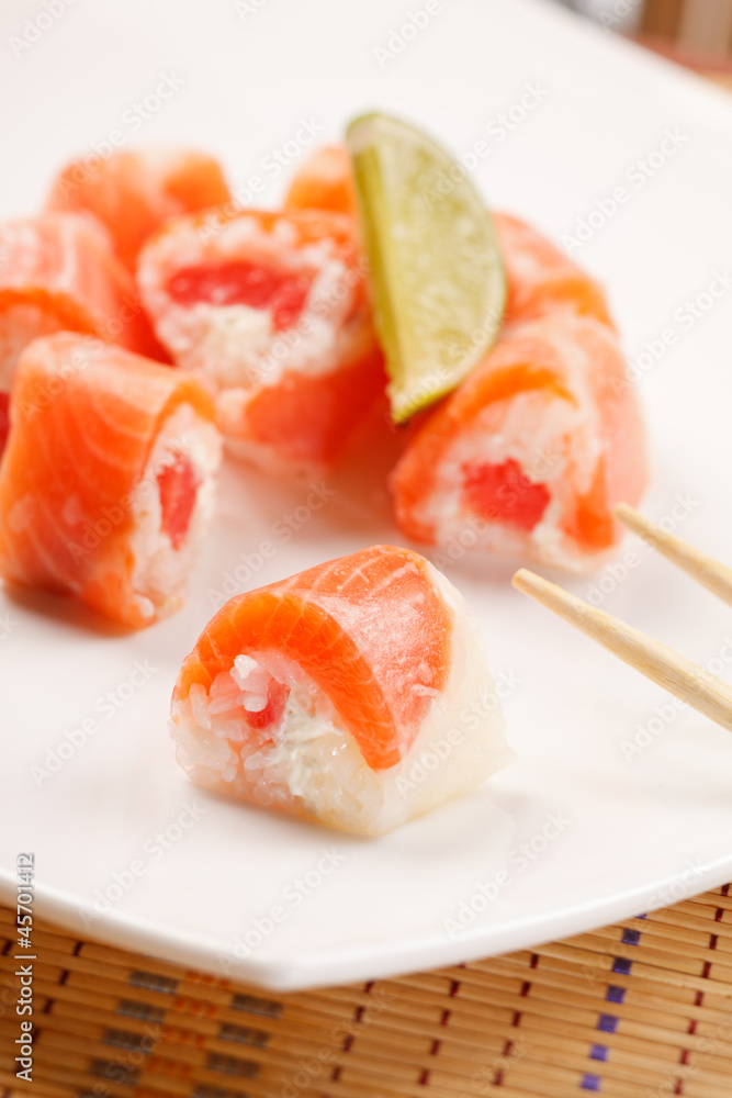 sushi with grapefruit in rice paper sushi with grapefruit in rice paper