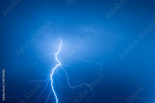 lightning bolt striking the night sky