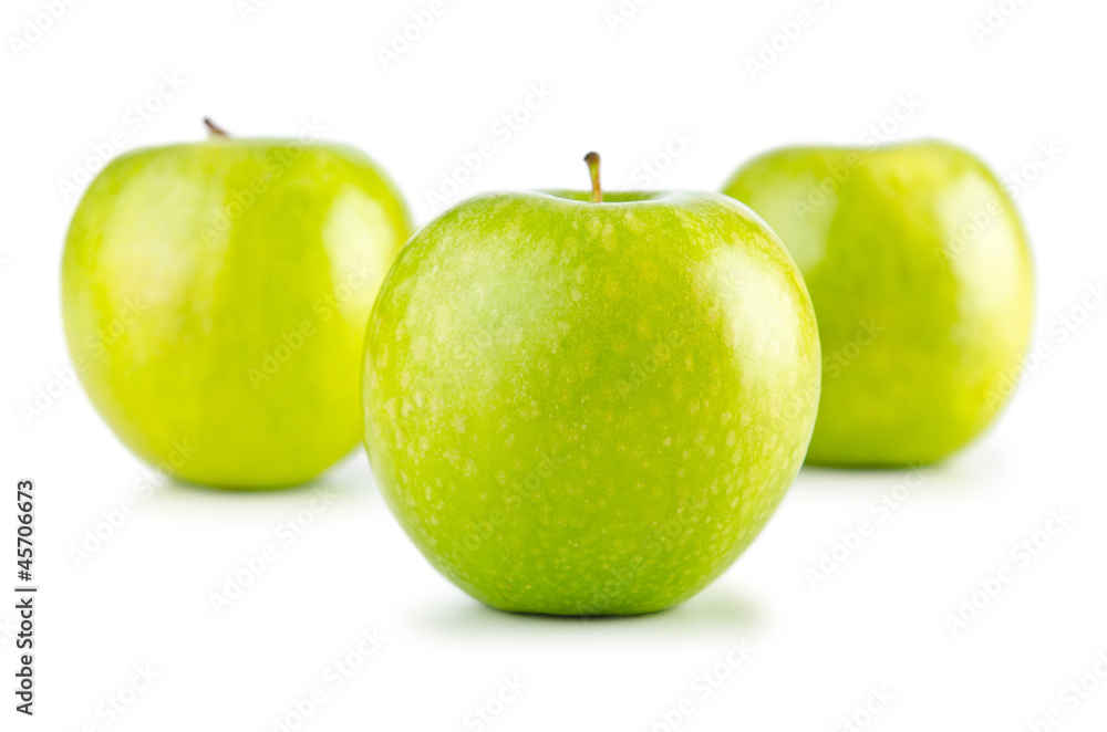 Green apples isolated on the white background Green apples isolated on the white background