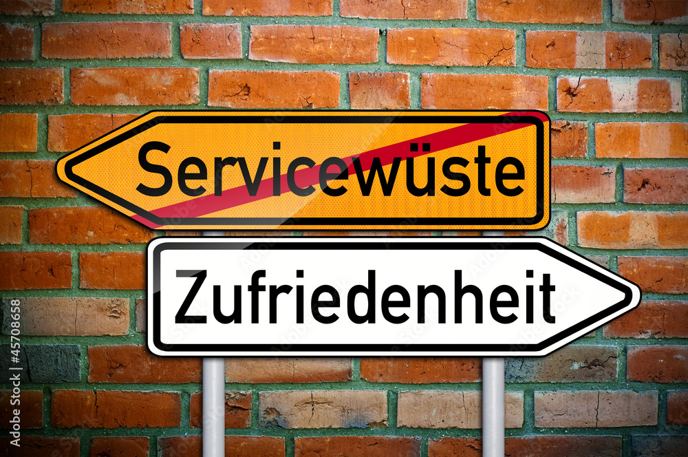 Wegweiser mit Servicewüste und Zufriedenheit Wegweiser mit Servicewüste und Zufriedenheit