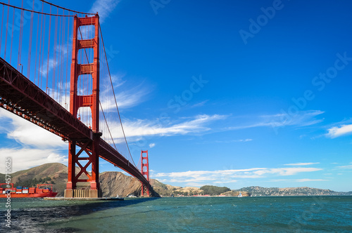 Golden Gate bridge with the cargo boat