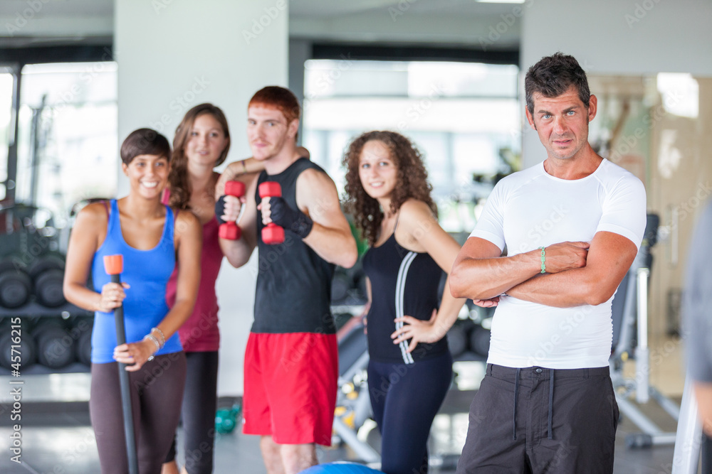 Group of People at Gym with Instructor Group of People at Gym with Instructor