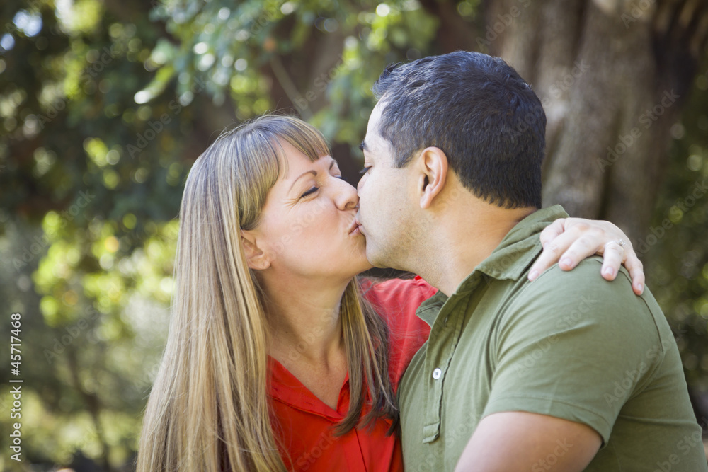 Attractive Mixed Race Couple Enjoying A Day At The Park Attractive Mixed Race Couple Enjoying A Day At The Park