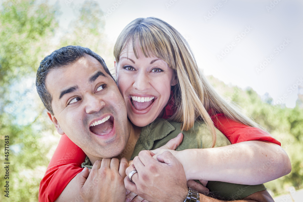 Attractive Mixed Race Couple Piggyback at the Park