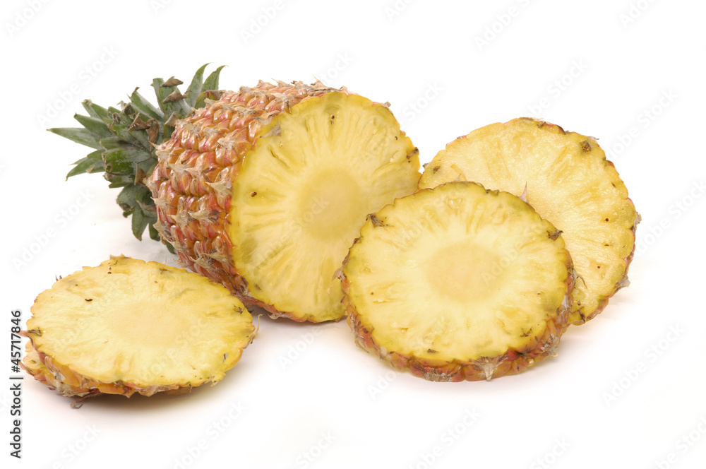 fresh pineapple fruits with cut of isolated fresh pineapple fruits with cut of isolated
