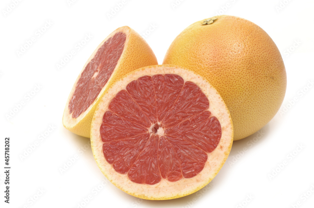 Whole fresh grapefruit and slices Whole fresh grapefruit and slices