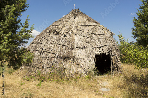 Traditional straw hut in greek country