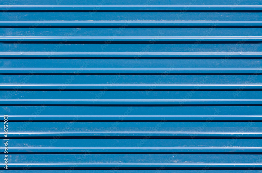 Horizontal ridged blue painted metal wall texture Horizontal ridged blue painted metal wall texture