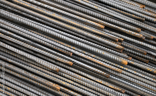 Steel rods used in construction to reinforce concrete