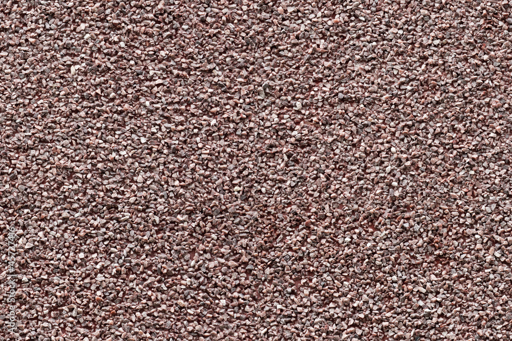 Seamless background texture of red granite chips panel Seamless background texture of red granite chips panel