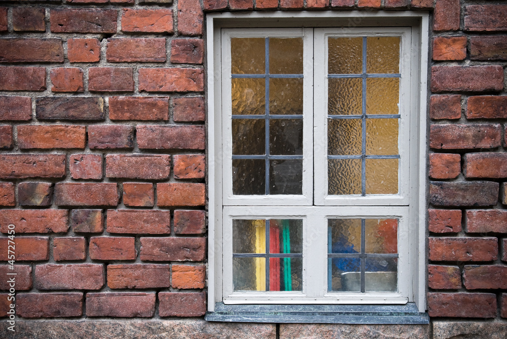 Background texture of old red brick wall with window Background texture of old red brick wall with window