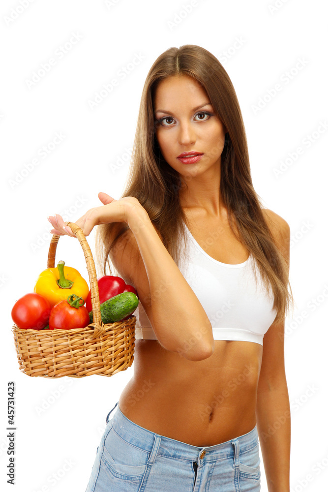 beautiful young woman with vegetables in basket, isolated beautiful young woman with vegetables in basket, isolated