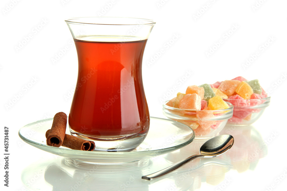 glass of Turkish tea and rahat Delight, isolated on white glass of Turkish tea and rahat Delight, isolated on white