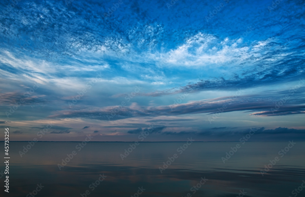 Blue sea, sky and clouds