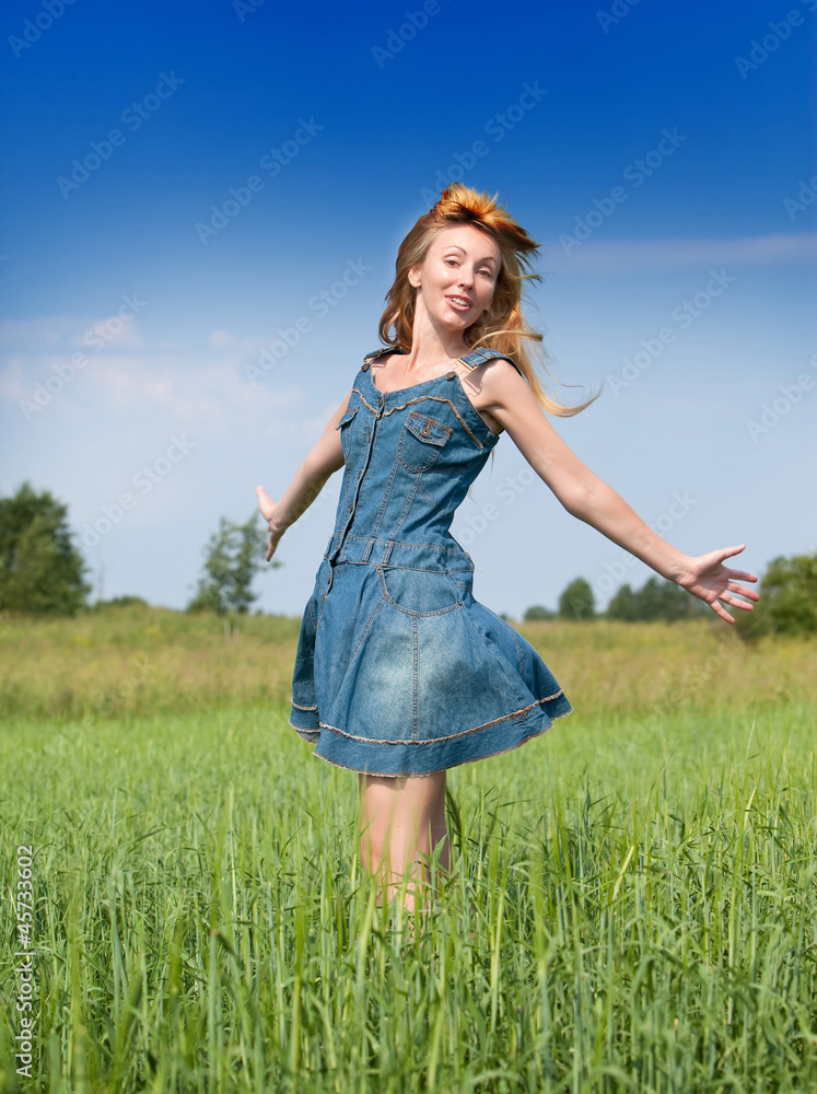 happy young woman in the field of green ears.. happy young woman in the field of green ears..