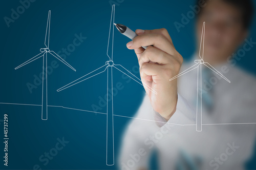 Hand of Business Man Draw Turbine Power Generator