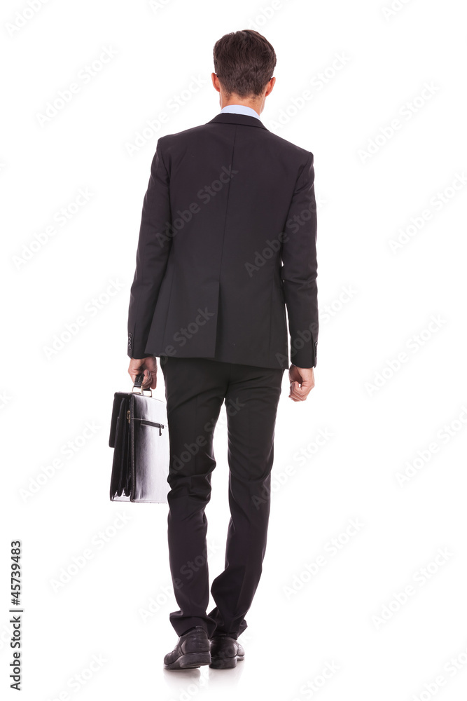 back view of a business man standing back view of a business man standing