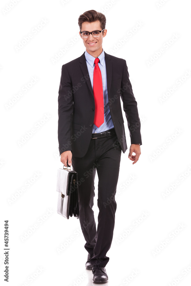 business man is walking with briefcase business man is walking with briefcase