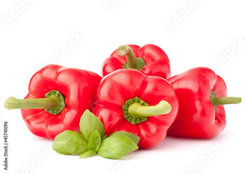 Sweet red pepper and basil leaves still life