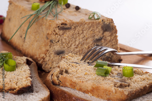 Fresh chicken pate with vegetables and herbs photo