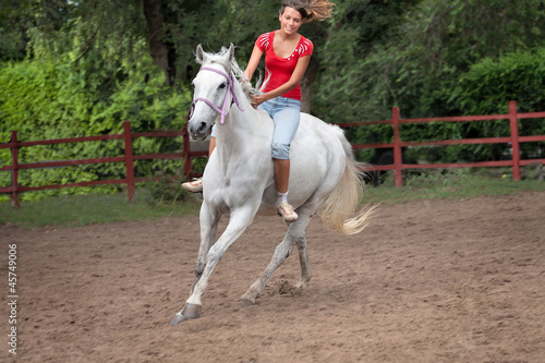Horsewoman riding © alextan8