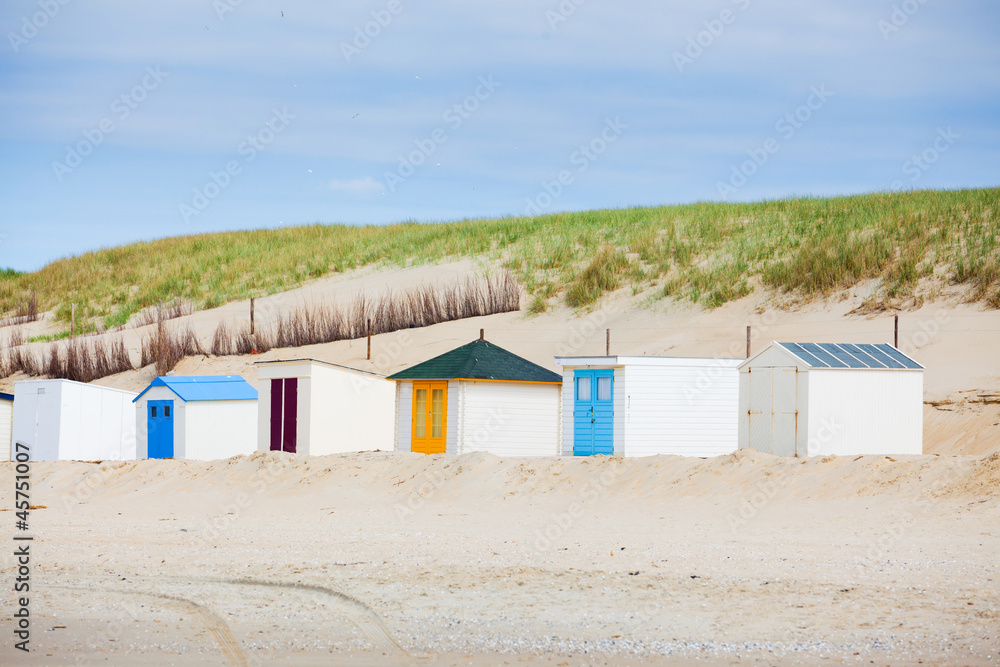 houses on the beach with blue sky