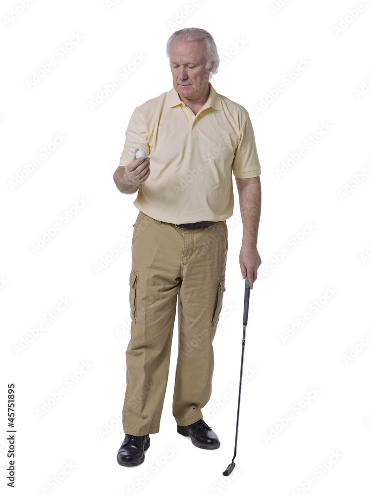 old man golfer holding golf ball old man golfer holding golf ball