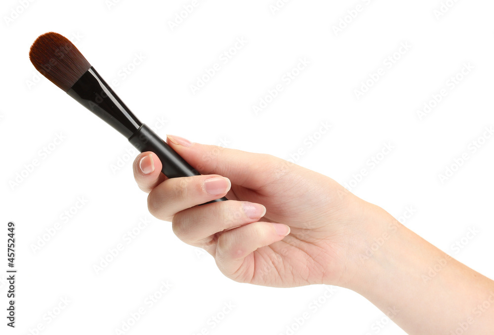 hand with black brush for make-up isolated on white. hand with black brush for make-up isolated on white.