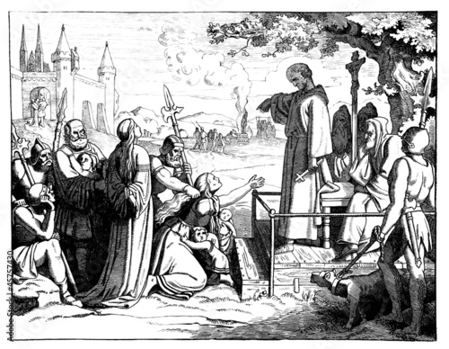 Medieval scene : condamning a woman to be burn ! photo