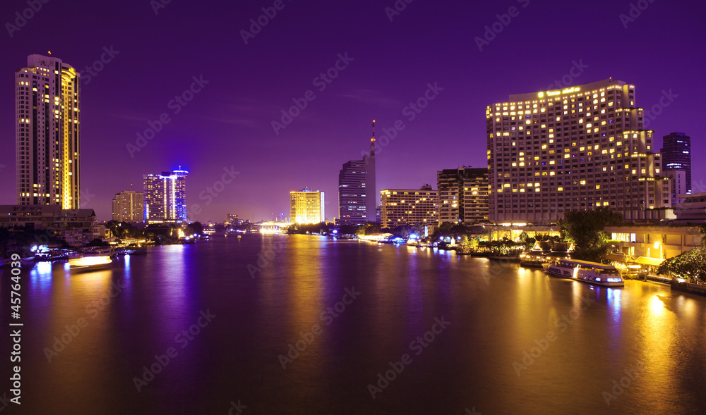 Obraz premium City and the river in the night time.