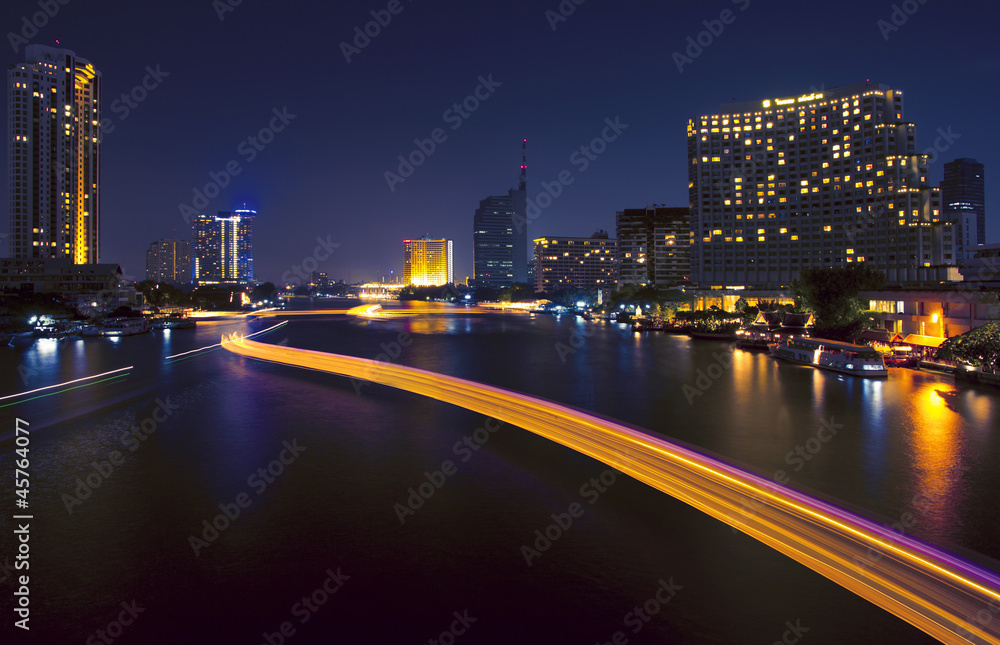Fototapeta premium City and the river in the night time.