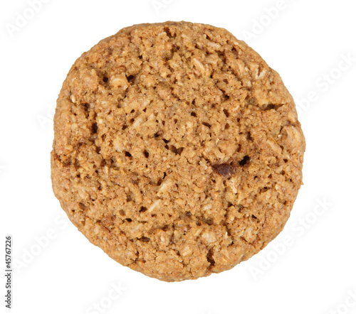 close up of whole grain cookie with oatmeal isolated on white