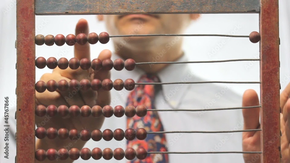 businessman with abacus over white background