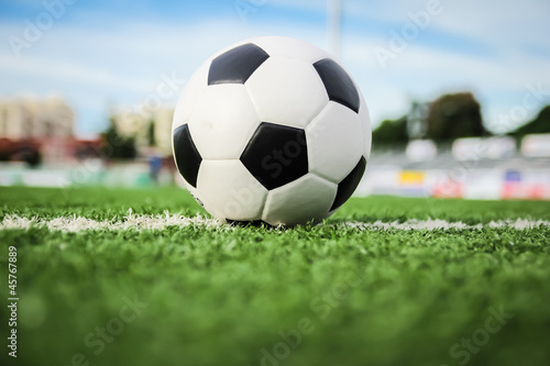 football on green grass © tungphoto