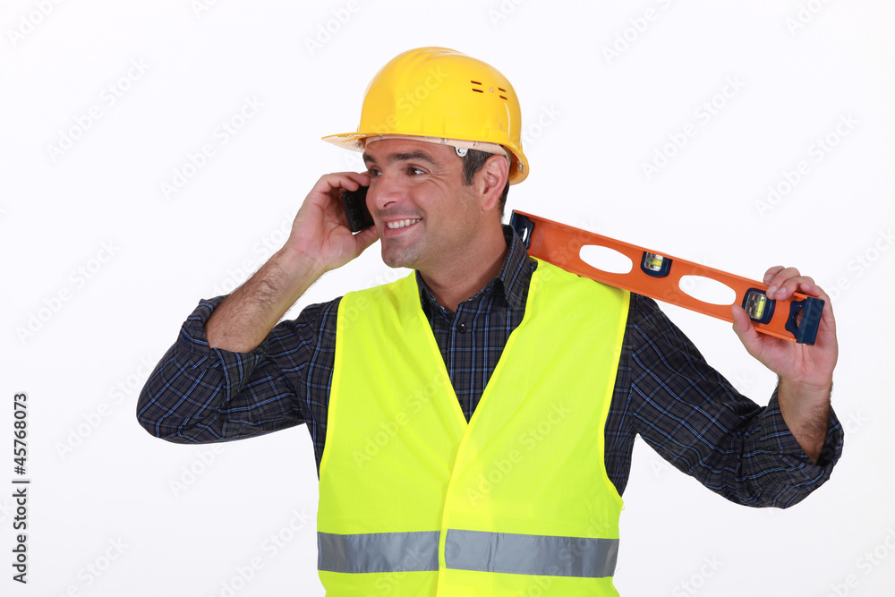 Tradesman talking on the phone Tradesman talking on the phone