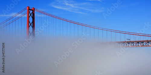 The Ponte 25 de Abril is a suspension bridge across the river Tejo. It links the cities of Lisbon and Almada in Portugal and is pictured shrouded in mist.