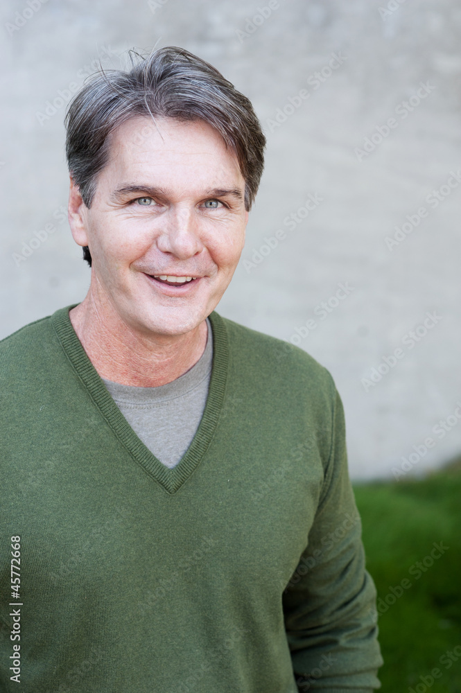 portrait of mature man in a park portrait of mature man in a park