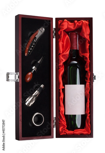 A bottle of red wine and sommelier set