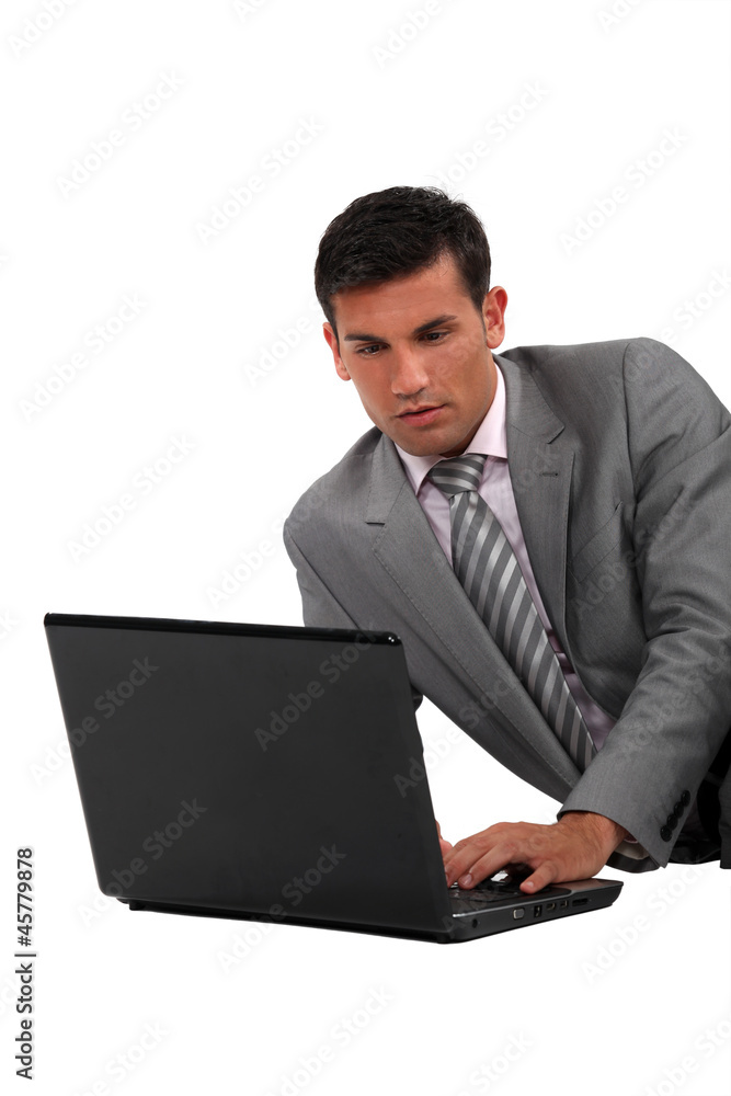 Elegant man with a computer Elegant man with a computer