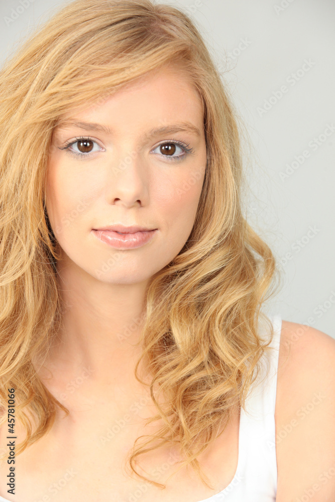 Portrait of a pretty young woman in a vest Portrait of a pretty young woman in a vest