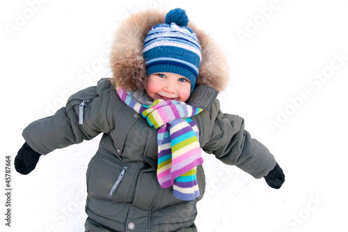Obraz na płótnie little boy in winter w salonie