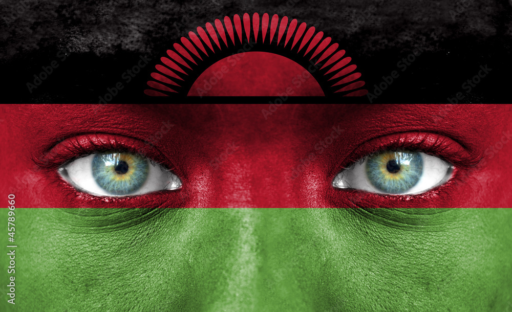 Human face painted with flag of Malawi