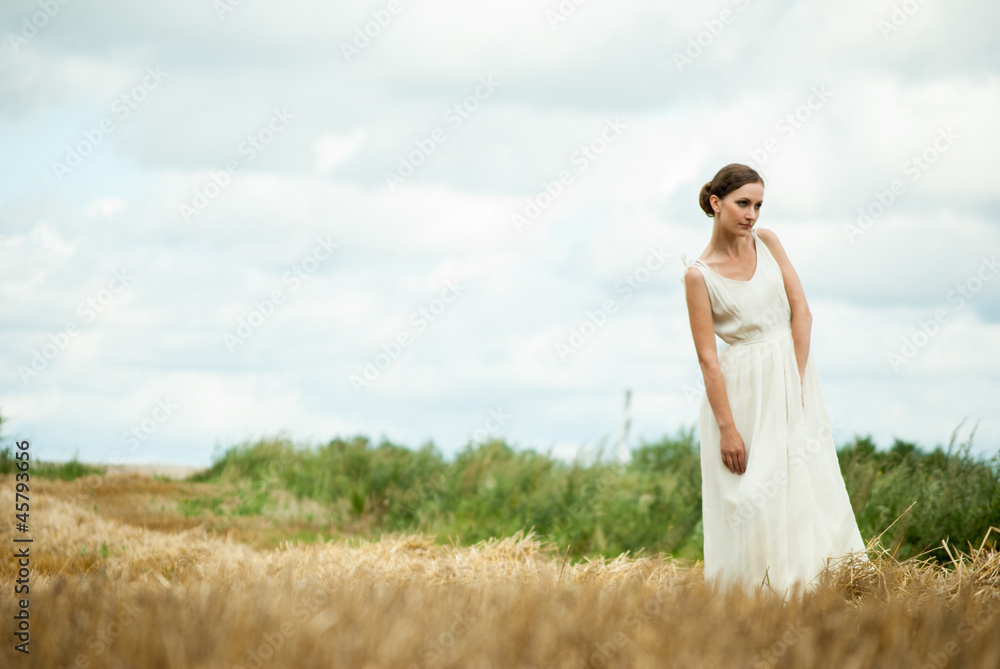 Beautiful lady in wheat field 