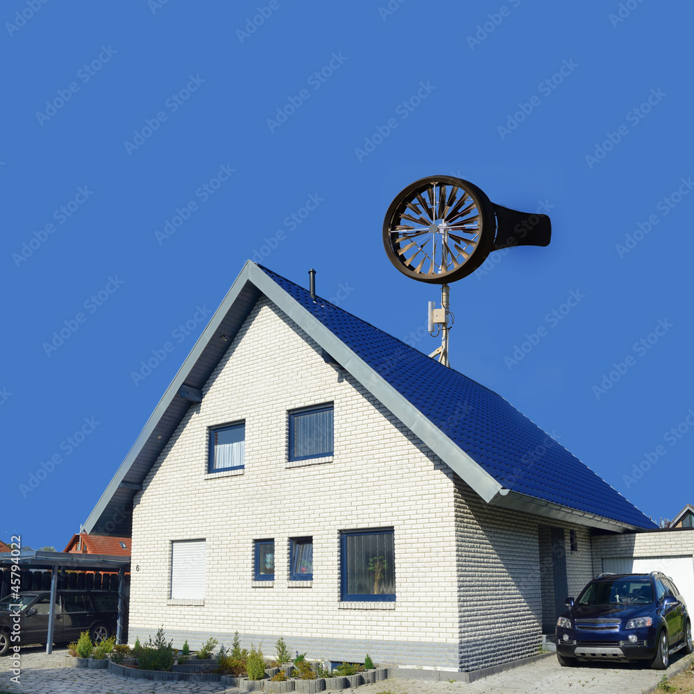 Windrad Kleinwindanlage auf Einfamilienhaus StockFoto Adobe Stock