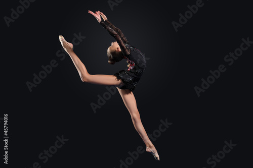 Wallpaper Mural Young woman in gymnast suit posing Torontodigital.ca