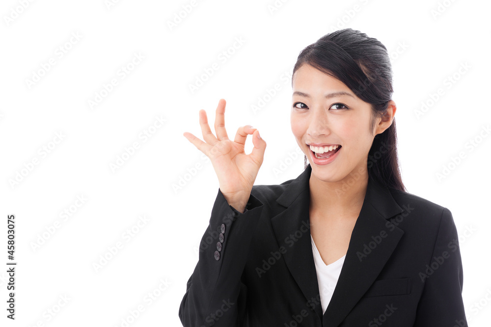asian businesswoman showing okay sign on white background asian businesswoman showing okay sign on white background