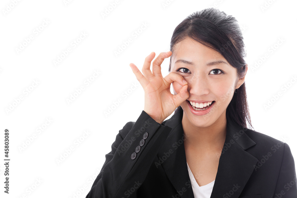 asian businesswoman showing okay sign on white background asian businesswoman showing okay sign on white background