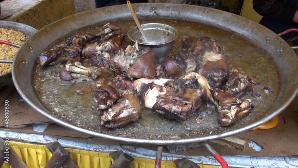 cooking meat in big iron pan cooking meat in big iron pan