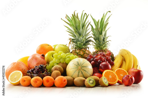 Composition with assorted fruits in wicker basket